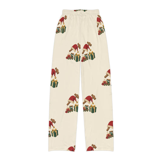 North Pole Workshop kids Christmas lounge pants, cream with elf and gift print flat lay, back view