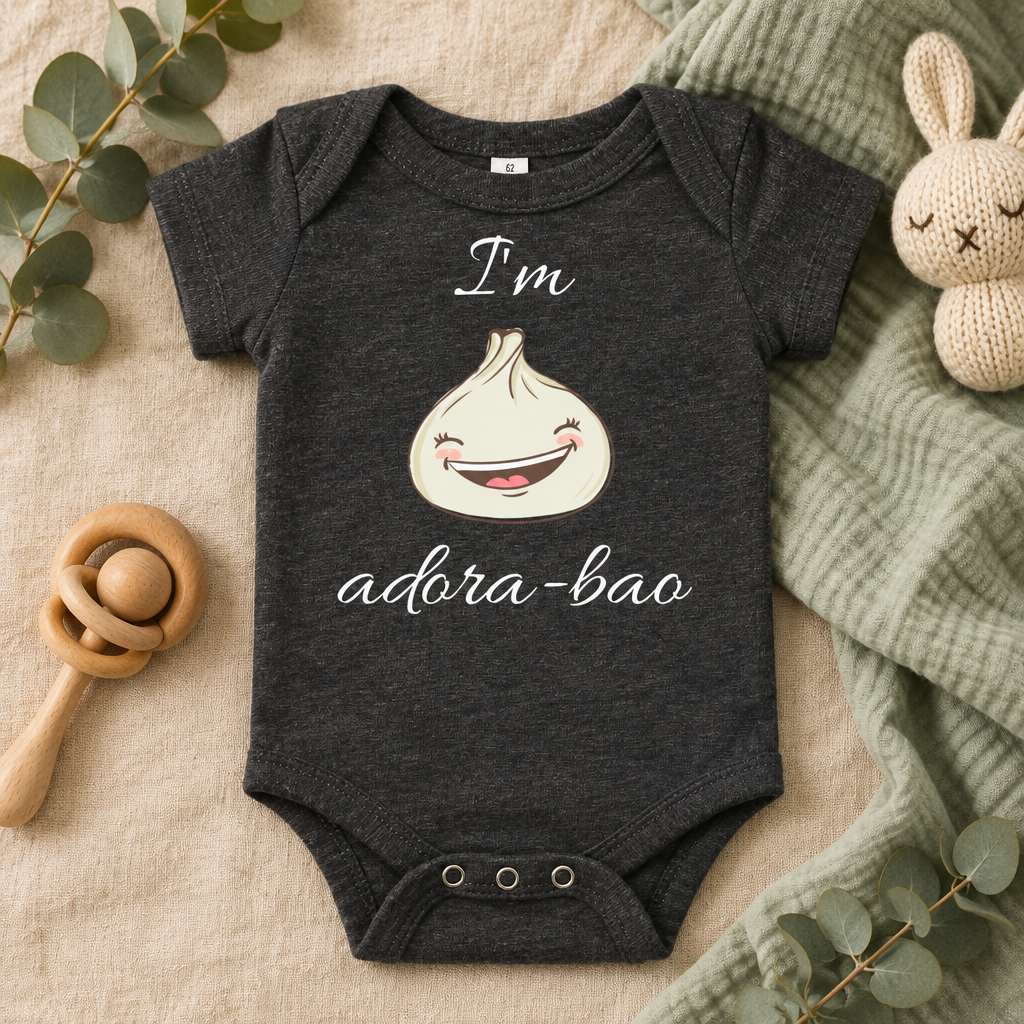 I'm Adora-Bao Dumpling Toddler Bodysuit in Dark Grey Heather, folded flat lay - Cartsy