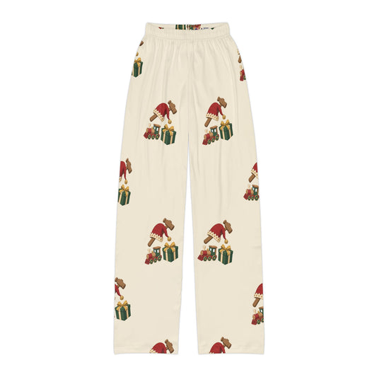 North Pole Workshop kids Christmas lounge pants, cream with elf and gift print flat lay, front view