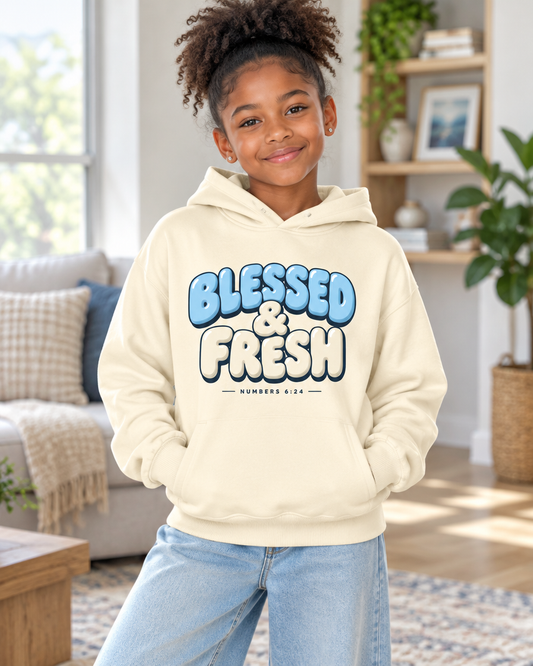 Kid wearing the Cartsy Blessed & Fresh puffy bubble letter Christian hoodie in ivory