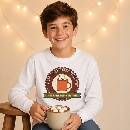 Boy holding a mug of cocoa in the Certified Cocoa Tester long sleeve tee