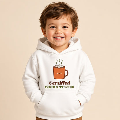 Toddler in the white Certified Cocoa Tester fleece hoodie