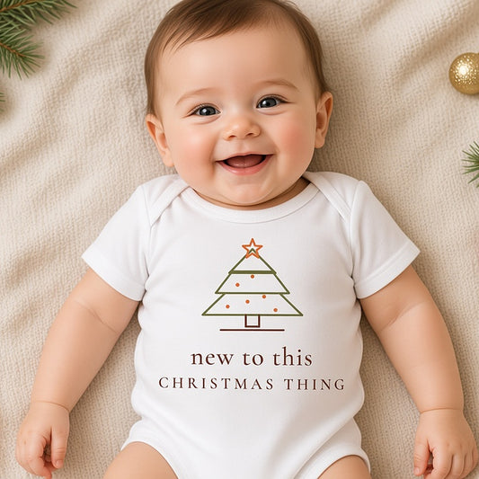 Baby in the white New to This Christmas Thing fine-line Christmas tree bodysuit