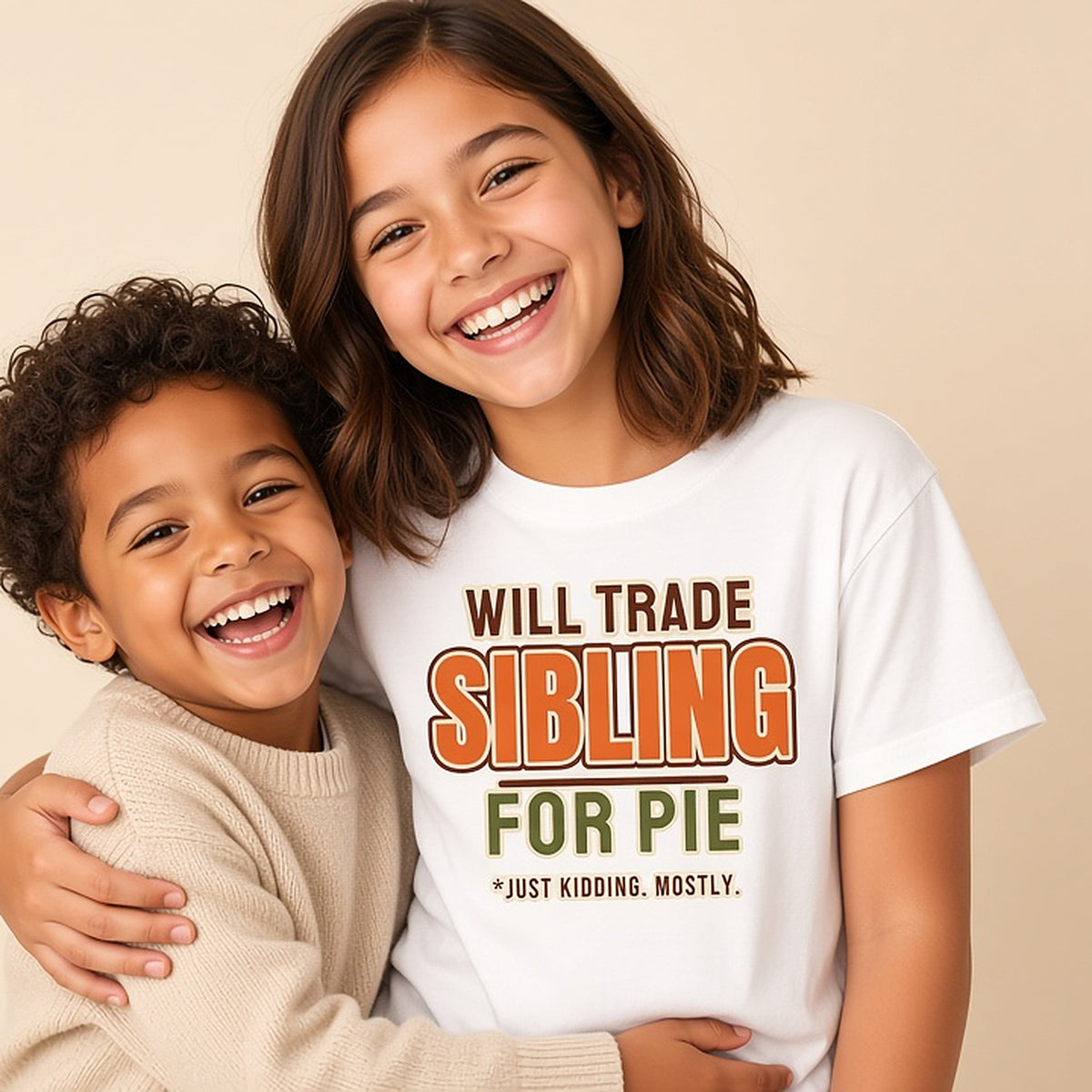 Big kid wearing the Will Trade Sibling for Pie shirt next to a younger sibling