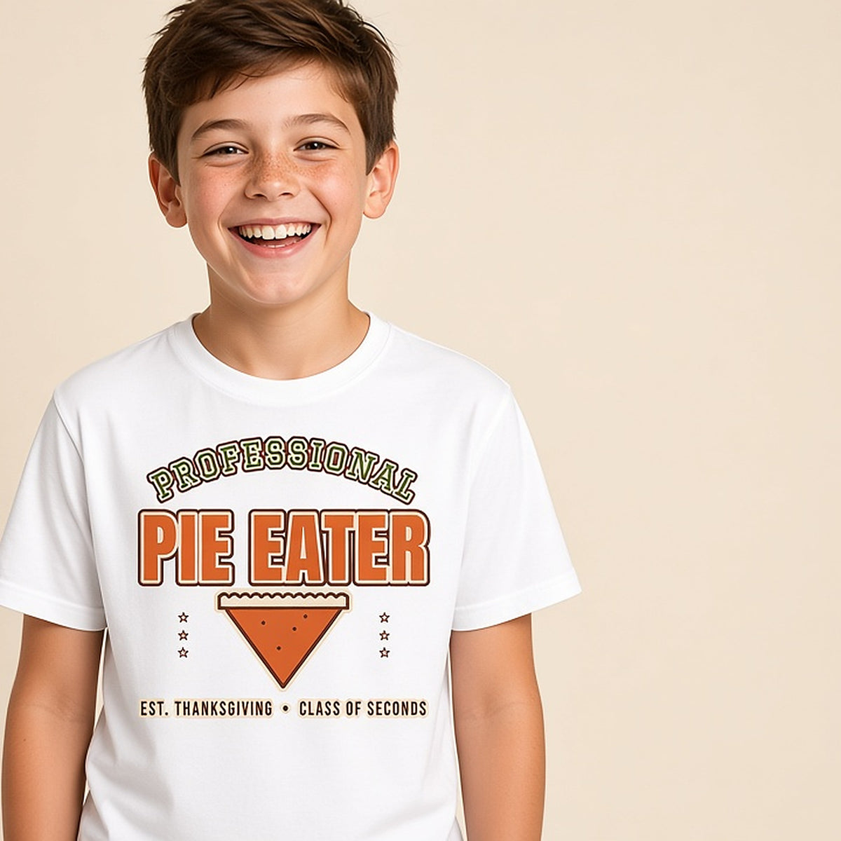 Boy in the white Professional Pie Eater varsity-style kids Thanksgiving tee