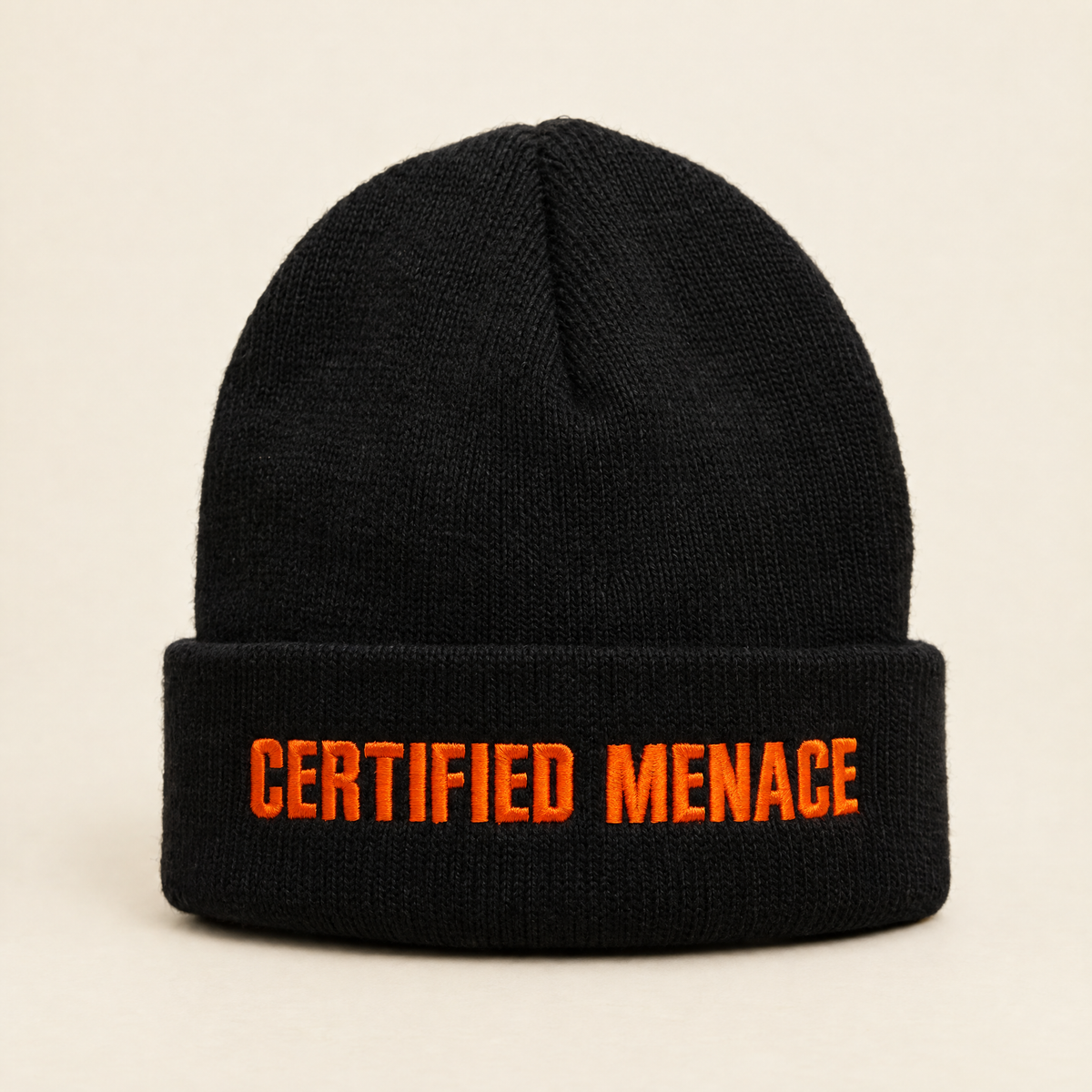 Black cuffed beanie embroidered with Certified Menace in orange