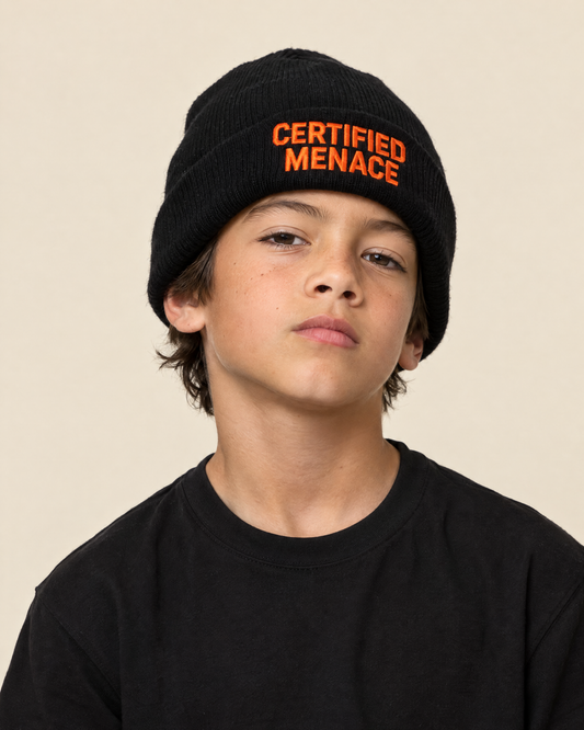 Kid wearing the Certified Menace embroidered beanie