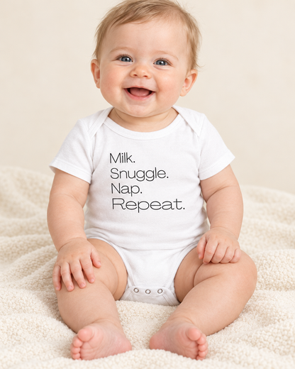 Baby wearing white Milk Snuggle Nap Repeat Baby Bodysuit - funny baby bodysuit with cute graphic, Cartsy