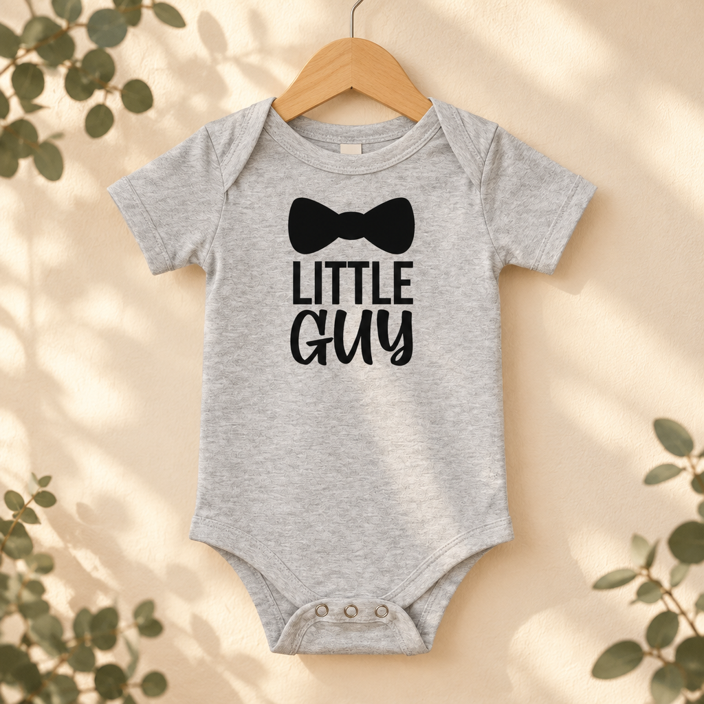 Little Guy Bow Tie Baby Bodysuit in Athletic Heather on a wooden hanger - Cartsy