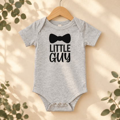Little Guy Bow Tie Baby Bodysuit in Athletic Heather on a wooden hanger - Cartsy