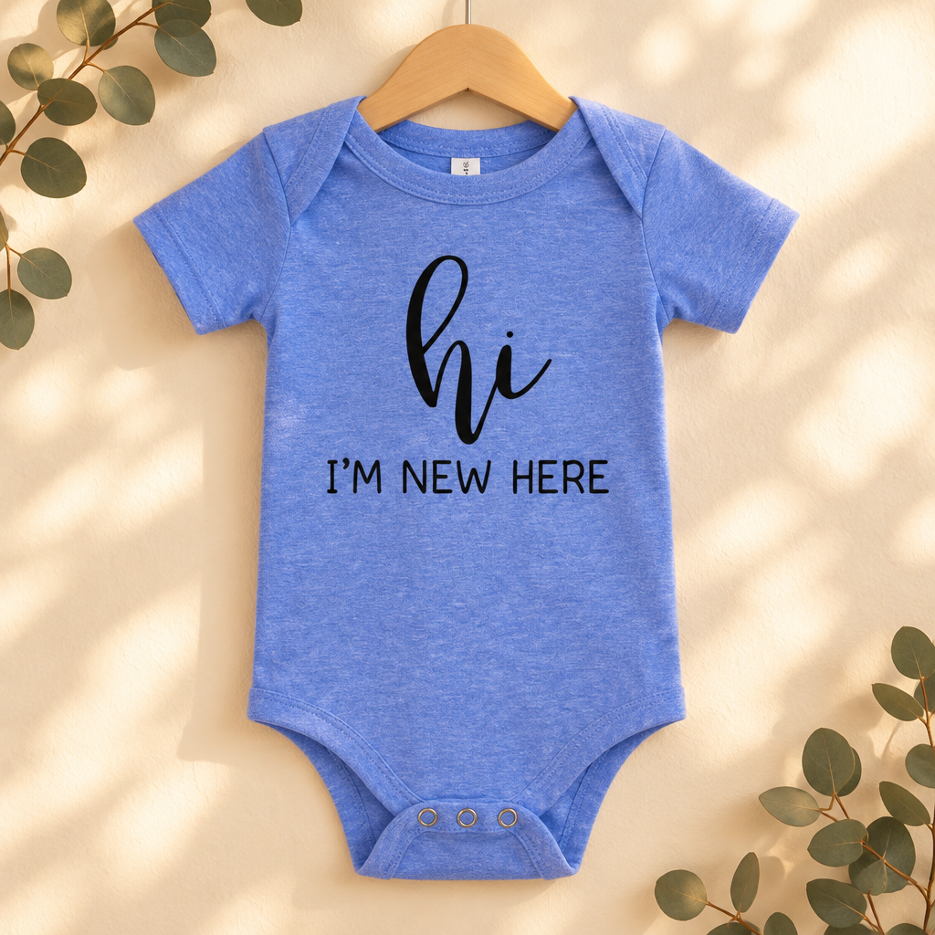Hi I'm New Here Newborn Baby Bodysuit in Heather Columbia Blue on a wooden hanger - Cartsy