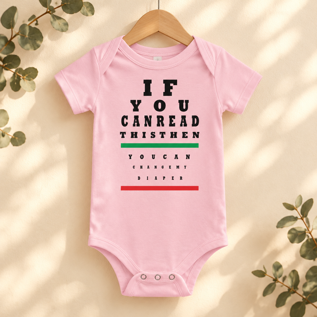 If You Can Read This Eye Chart Baby Bodysuit in Pink on a wooden hanger - Cartsy