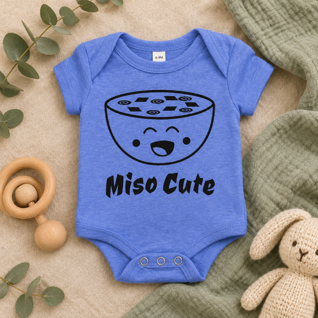 Miso Cute Baby Bodysuit in Heather Columbia Blue, folded flat lay - Cartsy