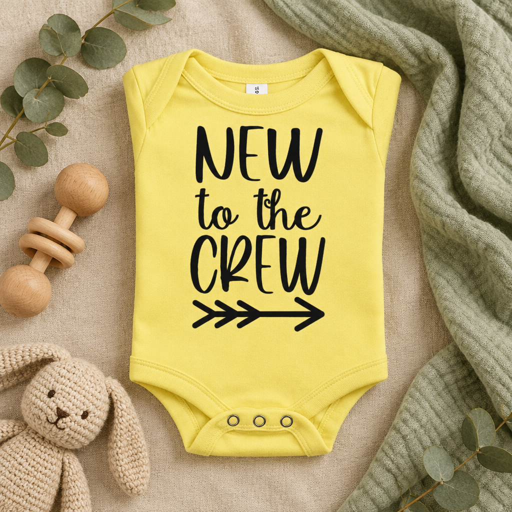 New to the Crew Baby Bodysuit in Yellow, folded flat lay - Cartsy