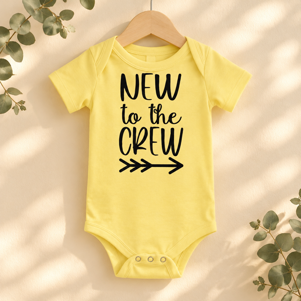 New to the Crew Baby Bodysuit in Yellow on a wooden hanger - Cartsy