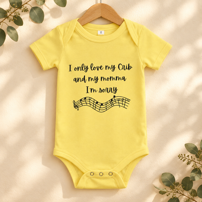 I Only Love My Crib and My Momma Baby Bodysuit in Yellow on a wooden hanger - Cartsy