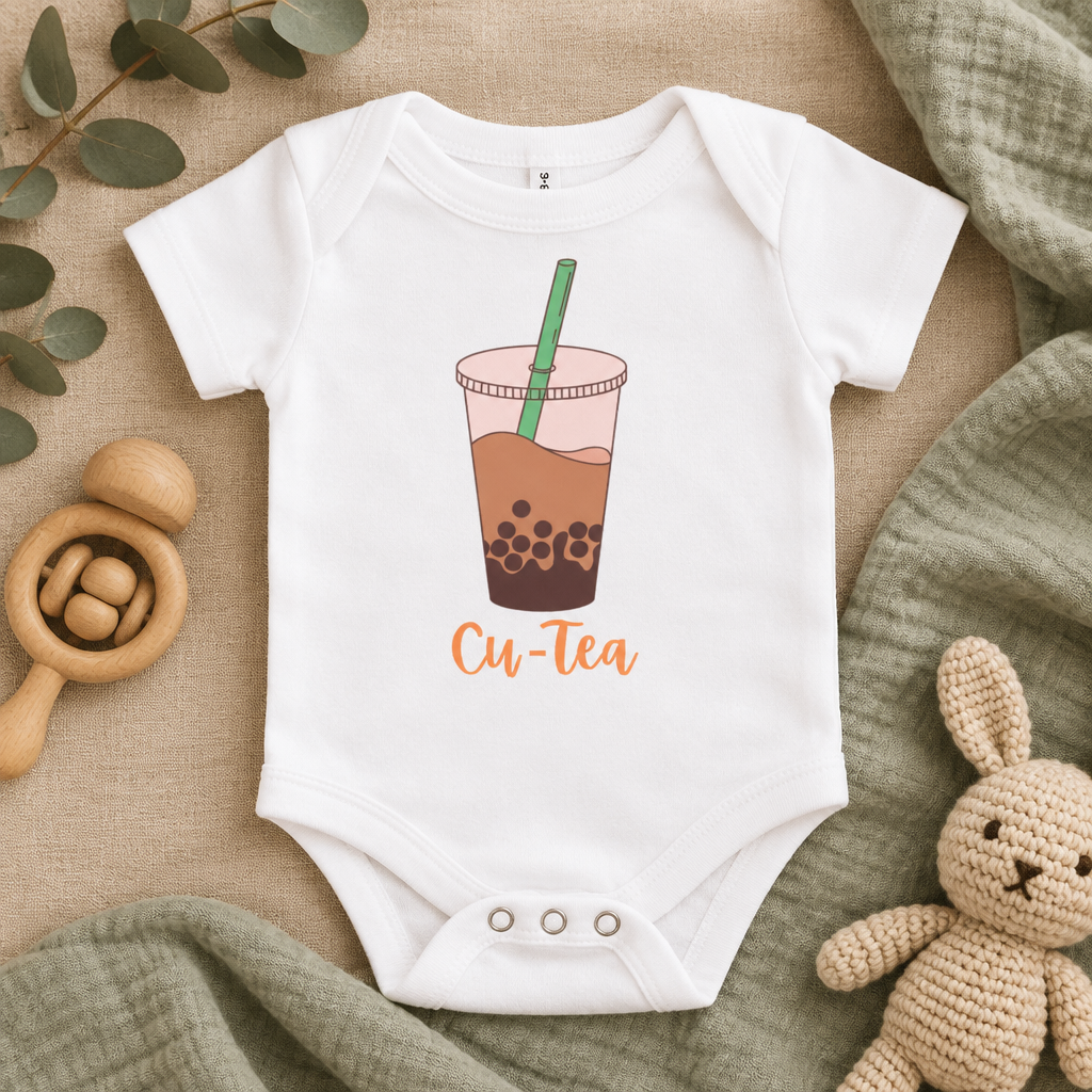 Cu-Tea Boba Tea Baby Bodysuit in White, folded flat lay - Cartsy