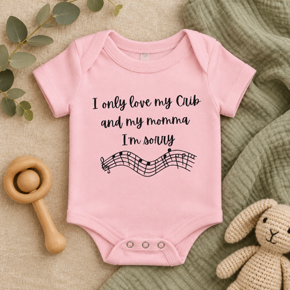 I Only Love My Crib and My Momma Baby Bodysuit in Pink, folded flat lay - Cartsy