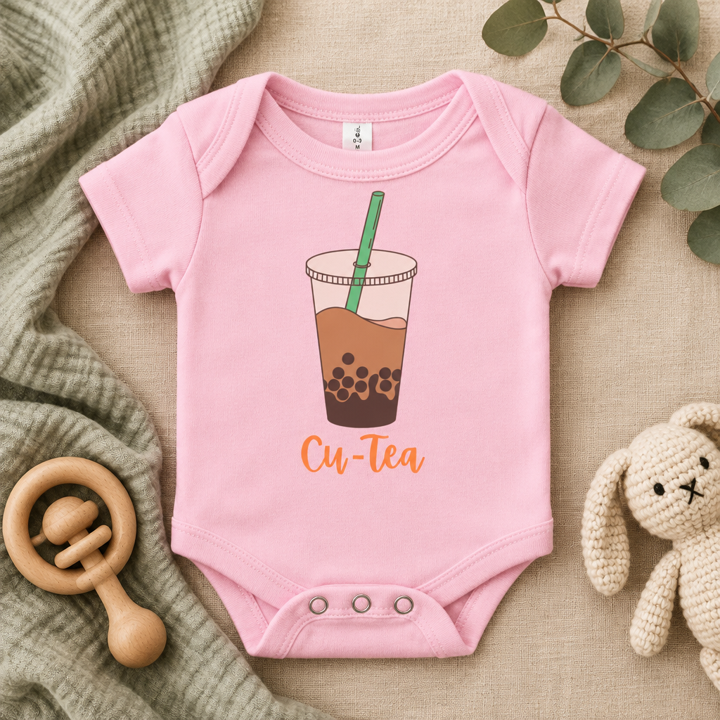 Cu-Tea Boba Tea Baby Bodysuit in Pink, folded flat lay - Cartsy