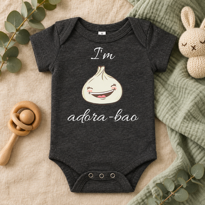 I'm Adora-Bao Dumpling Toddler Bodysuit in Dark Grey Heather, folded flat lay - Cartsy