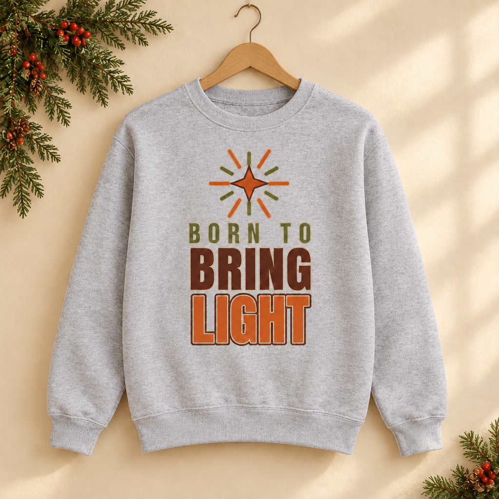 Modern Christian Kids Sweatshirt: Born to Bring Light Bold in Sport Grey on a wooden hanger - Cartsy
