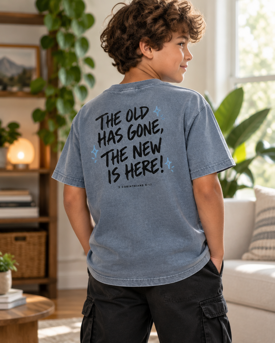Kid wearing the Cartsy Made New 2 Corinthians 5:17 washed denim blue faith tee
