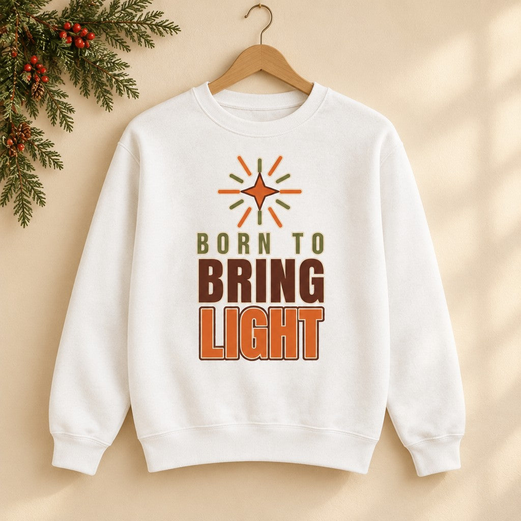 Modern Christian Kids Sweatshirt: Born to Bring Light Bold on a wooden hanger