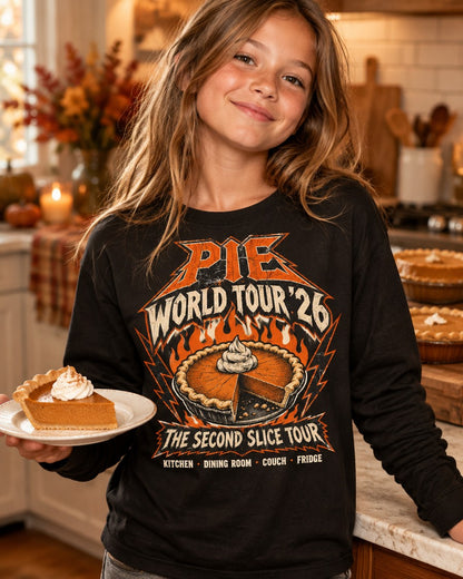 Kid wearing the Pie World Tour '26 kids Thanksgiving long sleeve tee with a flaming pie rock tour graphic