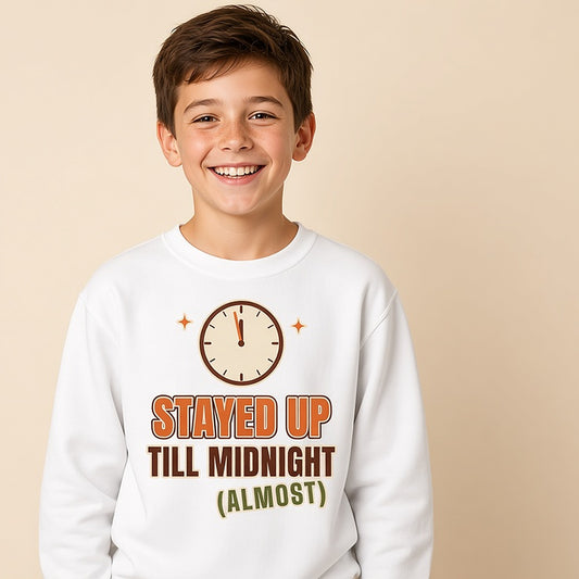 Boy in the white Stayed Up Till Midnight (Almost) kids New Year sweatshirt