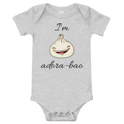 Heather gray baby bodysuit with a smiling bao bun and the script words 'I'm adora-bao'